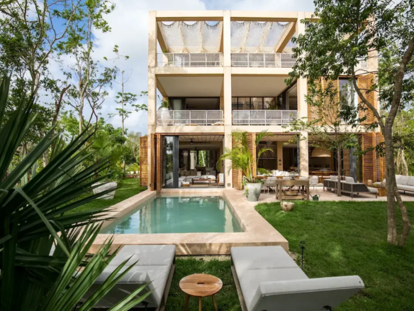 Cubic-style Palm Villa estate home at Corasol, Playa del Carmen, designed by Sordo Madaleno