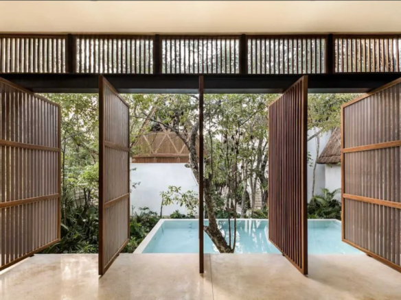 Cantilevered yoga pavilion over the pool at Jungle Keva, designed by Jaque Studio, Tulum