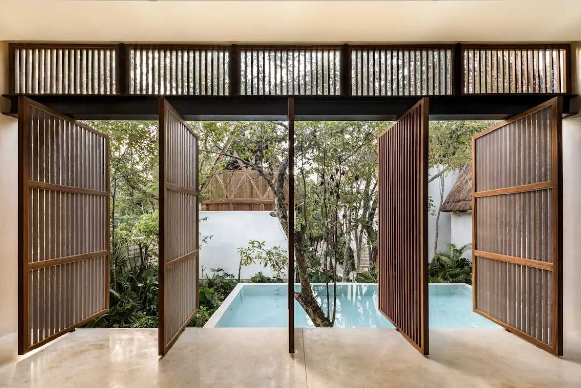 Cantilevered yoga pavilion over the pool at Jungle Keva, designed by Jaque Studio, Tulum