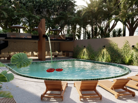 Pool and sun deck at Gobernador 28 condos in Playa del Carmen