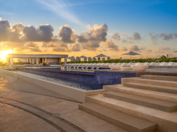 Infinity pool overlooking the marina at Blume Puerto Cancun