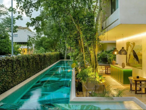 25-meter lap pool at Casa Libre Airena condos in Aldea Zama, Tulum