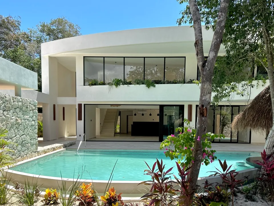 arcana-la-veleta-tulum-pool-terrace.webp Private pool and entertainment terrace at Arcana villa in La Veleta, Tulum