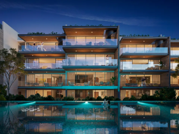 Central pool at Macondo Residences condos in Playacar Phase II, Playa del Carmen