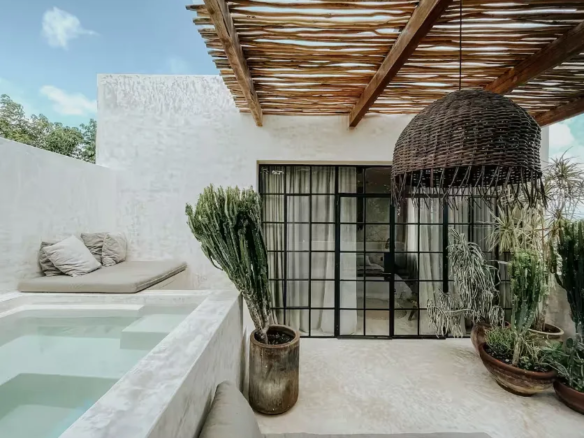 Private rooftop plunge pool with jungle canopy views at Penthouse Canopia in La Veleta Tulum