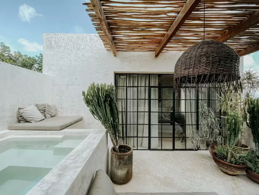 penthouse-canopia-la-veleta-tulum-rooftop-pool.webp Private rooftop plunge pool with jungle canopy views at Penthouse Canopia in La Veleta Tulum