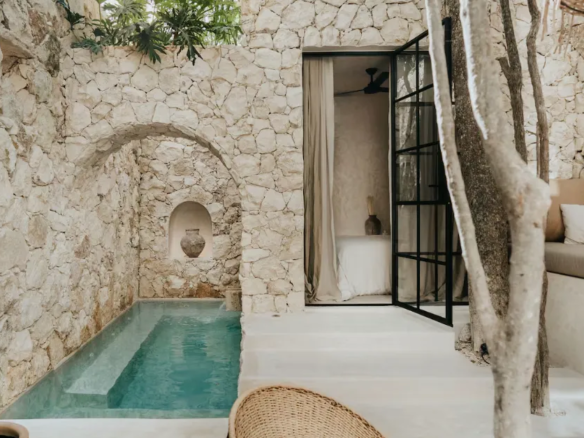 Private garden terrace off the living space at Casa Mirra in La Veleta, Tulum