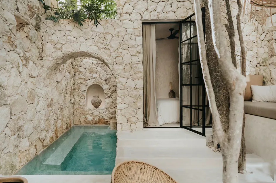 casa-mirra-la-veleta-tulum-garden-terrace.webp Private garden terrace off the living space at Casa Mirra in La Veleta, Tulum