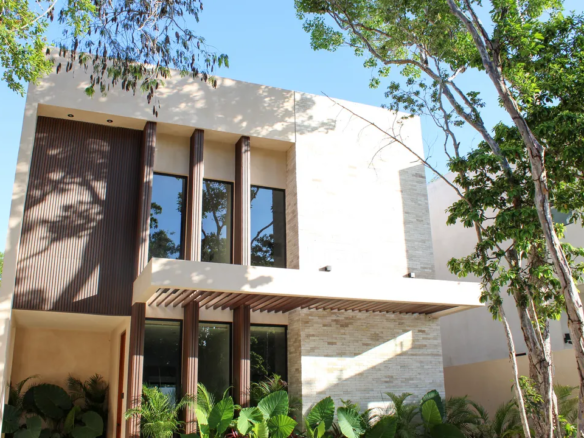 Exterior of Casa Pucte five-bedroom villa in the Kaybe gated community in Tulum