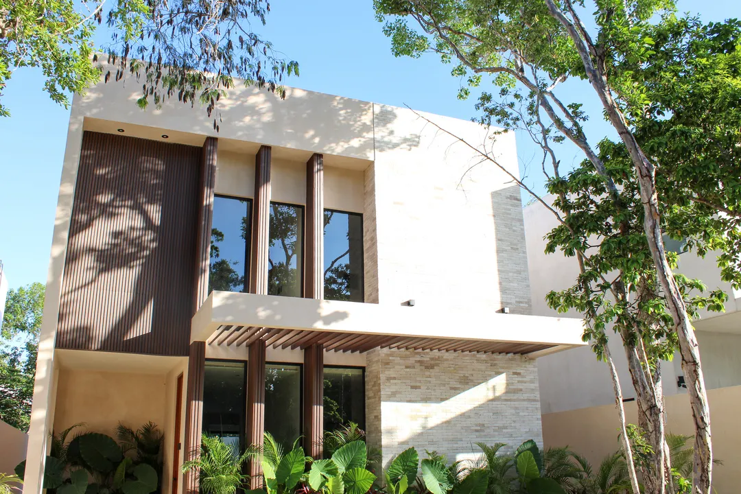 casa-pucte-kaybe-tulum-villa-exterior.webp Exterior of Casa Pucte five-bedroom villa in the Kaybe gated community in Tulum