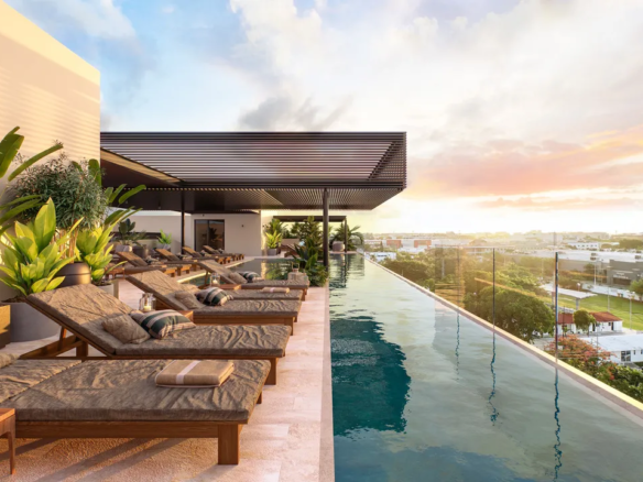Rooftop solarium at Costa Celeste with views over Centro Playa del Carmen