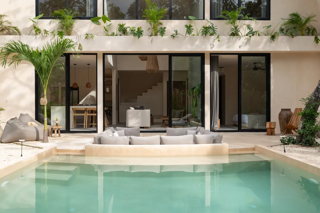 duna-villa-tulum-private-pool.webp Private pool and chukum-finished terrace at DUNA villa in Tulum.