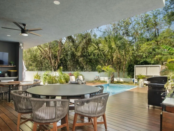 Casa Bosque Bambú villa exterior with private pool and tropical garden in Bosques de Bambu