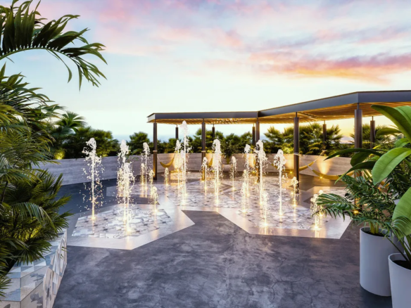 Rooftop pool and solarium at Kolmena condos in Playa del Carmen's Ejido Sur