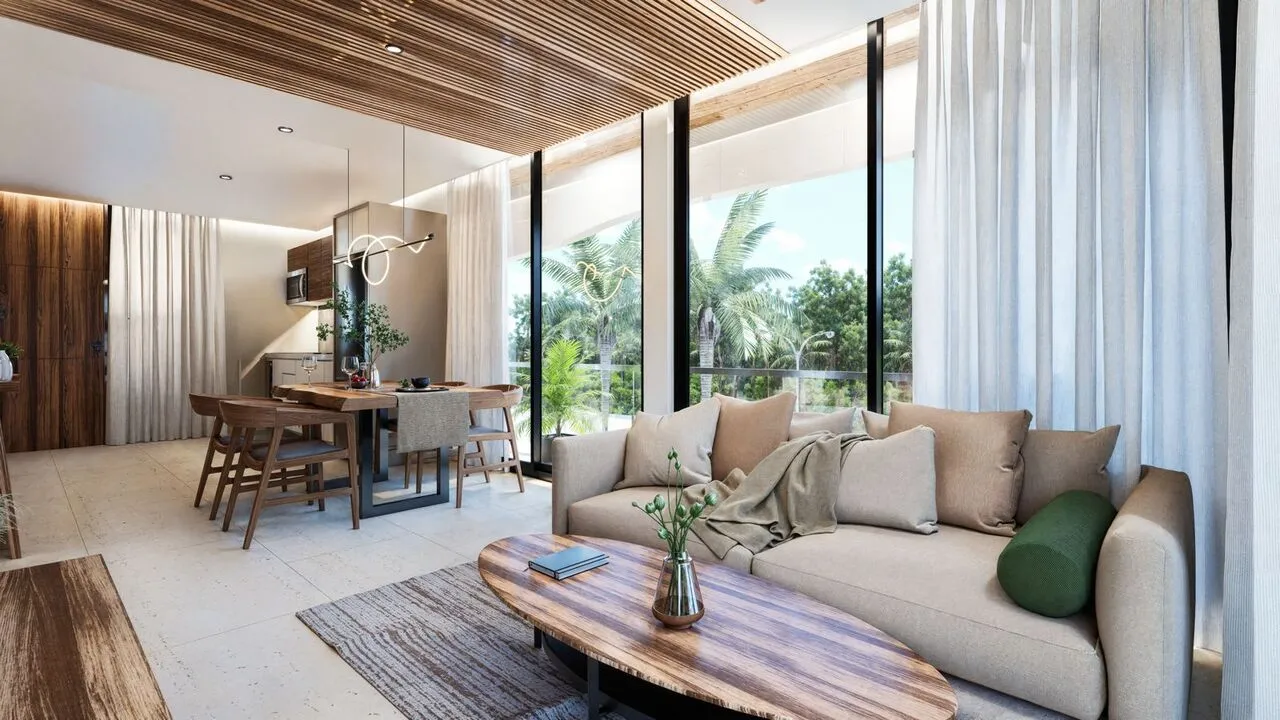 dk42-playadelcarmen-social area Two-bedroom condo interior at DK42 Playa del Carmen showing living area and balcony