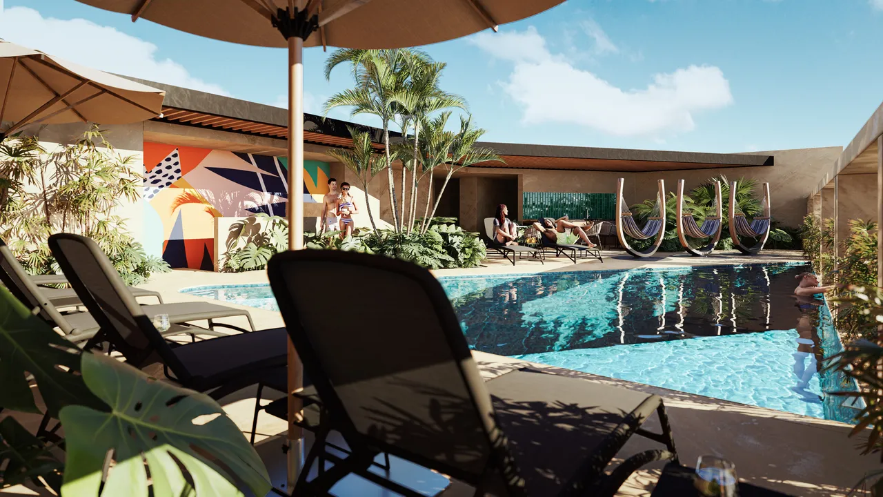 sensara-28-playa-del-carmen-pool.webp Pool and sun-lounger area at Sensara 28, Playa del Carmen